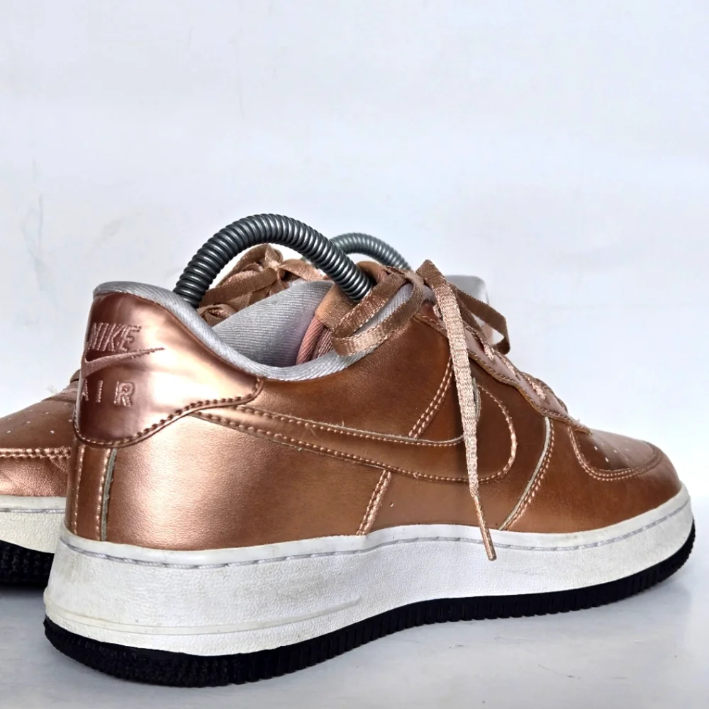 Nike pink metallic Air Force 1s size 7Y